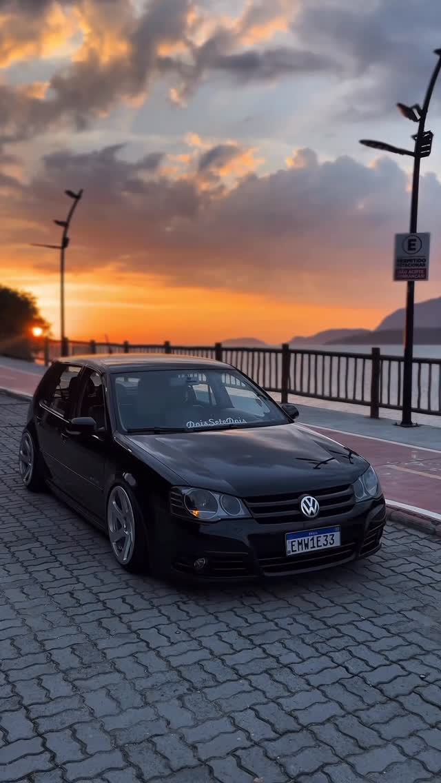 a VW Golf at sunset  | DSnKPprDeOi